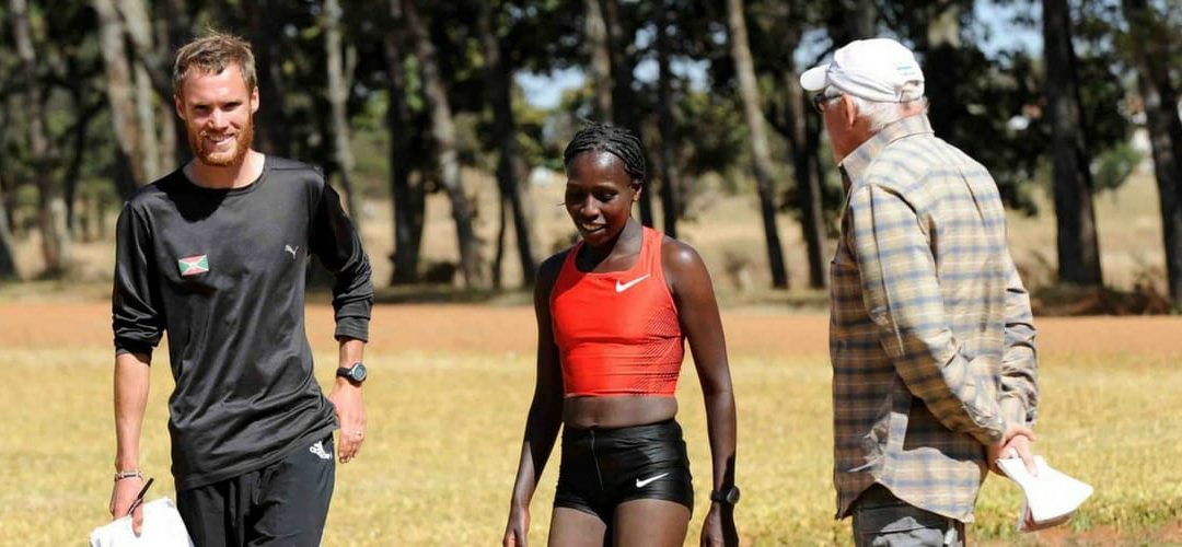 Gavin Smith (KE founder) with coach Renato Canova and athlete Florence Kiplagat