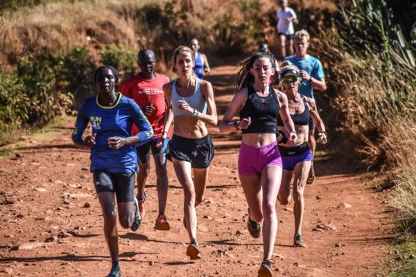 Kenya Experience Guests with local pacer Caroline