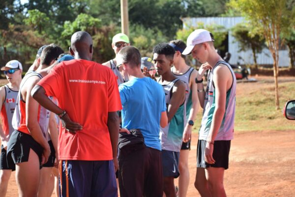 Hugo van den Broek giving advice to young athletes