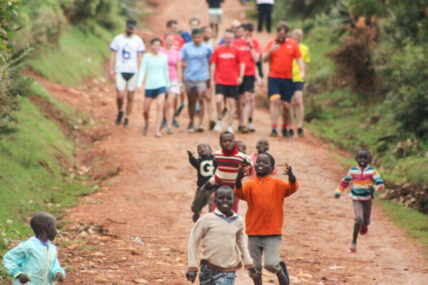 local school children running up hills