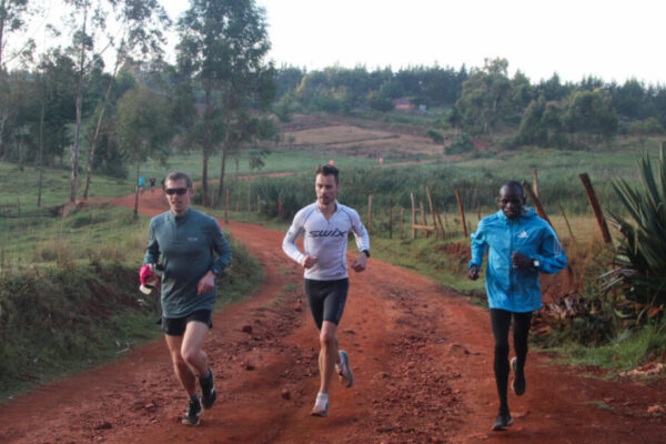 KE guests with Japhet running in Iten