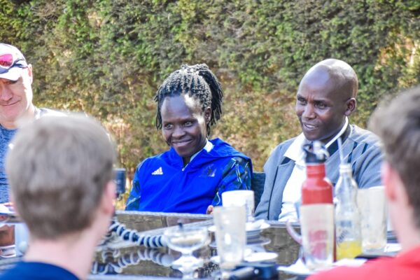 Helah Kiprop and David Marus chatting with KE guests