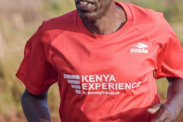 Willy Songok joining guests for a training session