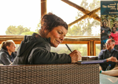 Taking notes at Marathon Camp Kenya