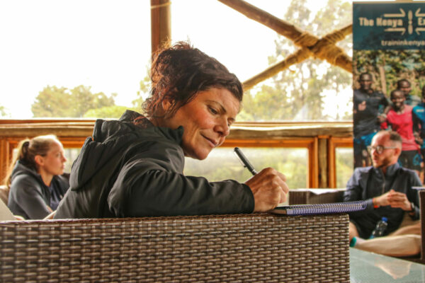 Taking notes at Marathon Camp Kenya