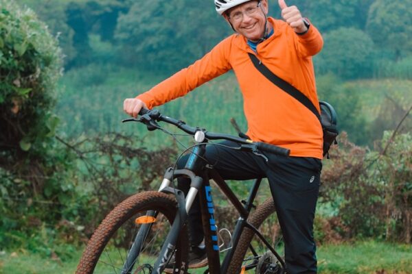 Coach Theuns following on the bike